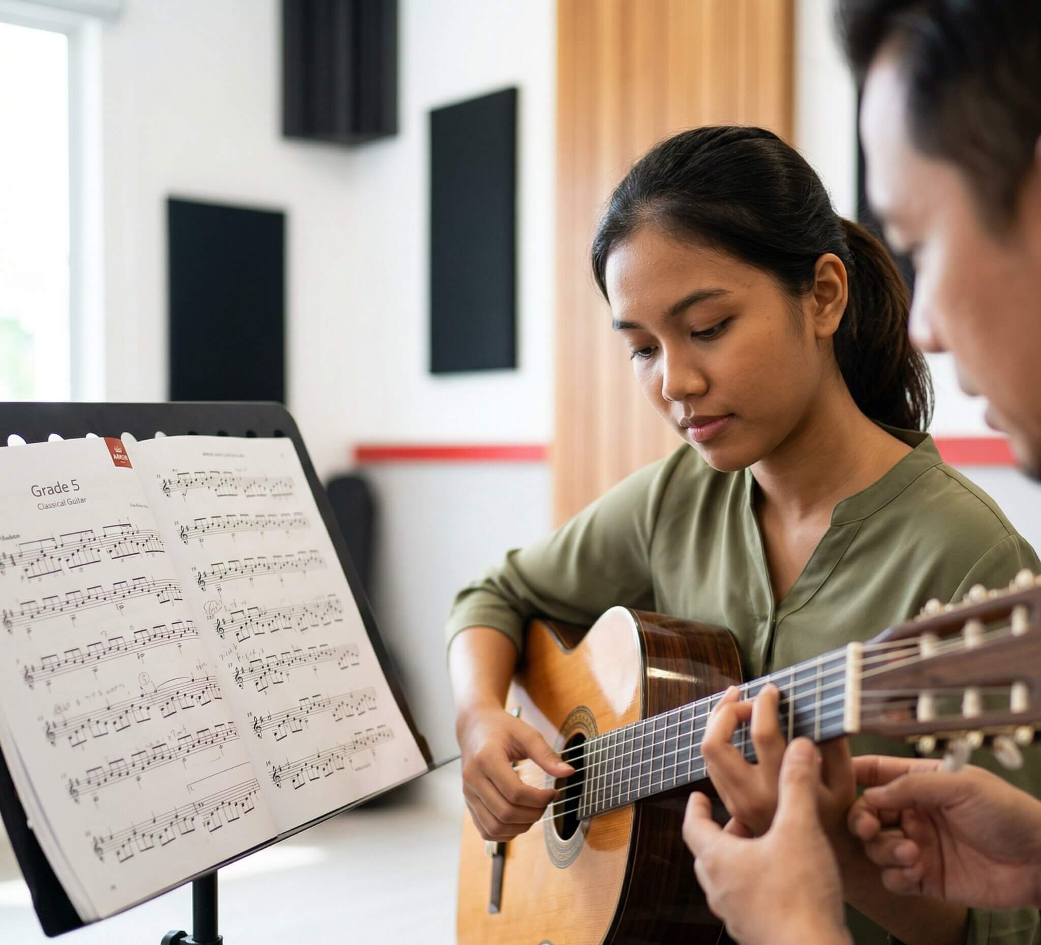 Classical guitar and sheet music