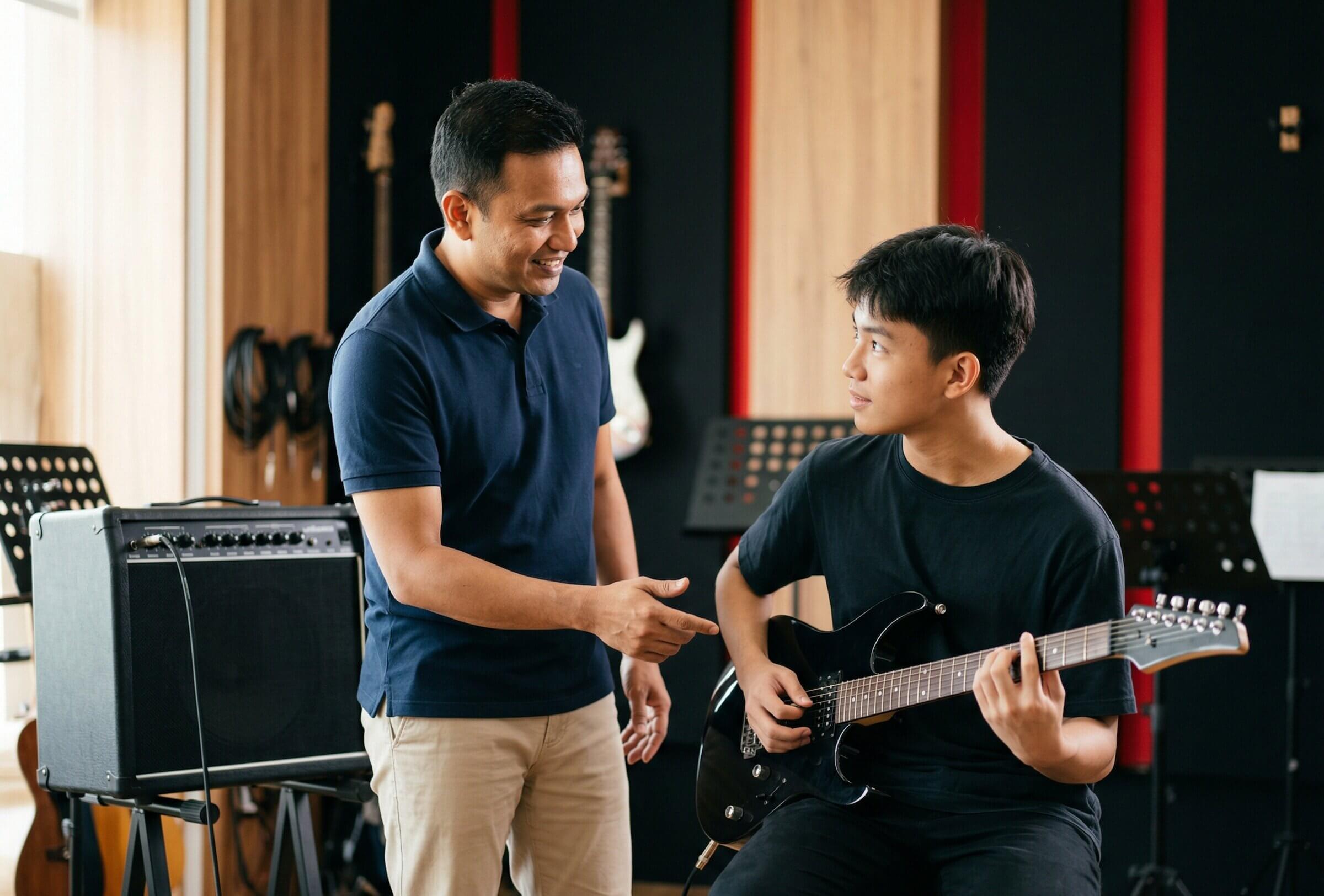 Electric guitar lesson in studio